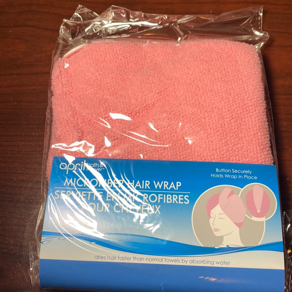 Pink microfiber hair wrap with button to stay in place. Available in blue also